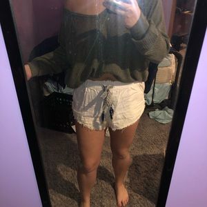 Float white shorts w/ raw hem and embroidered ties